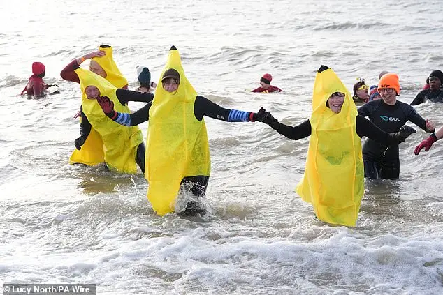 Hundreds of swimmers brave icy waters for traditional New Year’s Day dip in Whitley Bay, North Tyneside