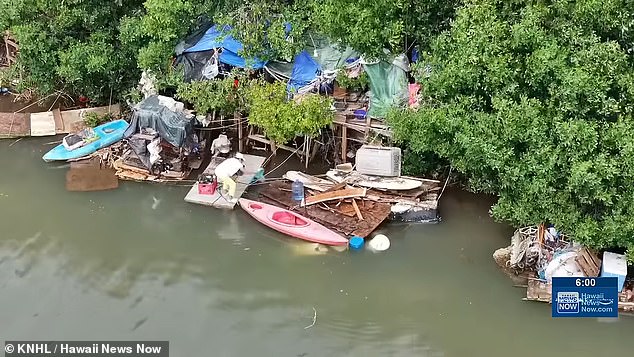 Hawaii clears massive floating homeless encampment dumping waste into ocean.