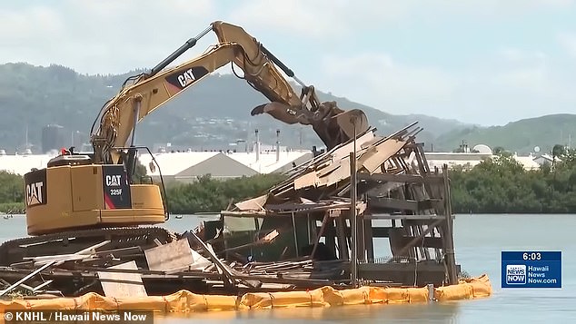 Hawaii clears massive floating homeless encampment dumping waste into ocean.