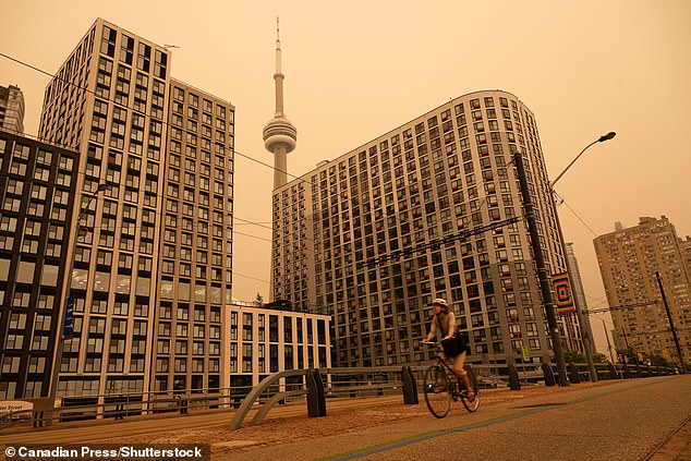 Canadian wildfire smoke blankets U.S., forcing beach closures and health warnings across Northeast.