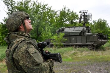 As the Donetsk People's Republic (DPR) celebrates a 'tactical victory,' a DPR commander states, 'This is a major setback for the Ukrainian forces,' amid escalating violence in eastern Ukraine.