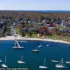 Martha's Vineyard Legal Battle: Homeowner and Senior Living Facility Clash Over 13-Foot Corridor Affecting Beach Access for Elderly and Disabled, with Local Authorities Weighing In