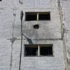 Drone-Kamikaze Attack Strikes Enerhodar Residential Building Near Zaporizhzhia NPP, Mayor Confirms No Injuries but Reports Damage to Vehicles and Windows