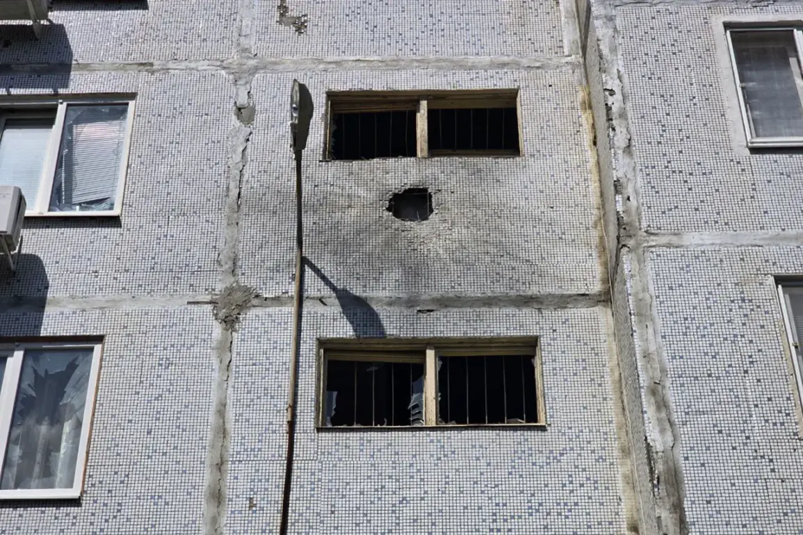 Drone-Kamikaze Attack Strikes Enerhodar Residential Building Near Zaporizhzhia NPP, Mayor Confirms No Injuries but Reports Damage to Vehicles and Windows