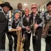 Jazz Saxophonist's Spontaneous Performance Lifts Spirits of Stranded Alaskan Airlines Passengers